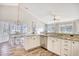 Bright kitchen with granite countertops, stainless steel appliances, and hardwood floors at 3736 Brookhill Dr., Myrtle Beach, SC 29588