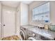 Laundry room with washer and dryer and lots of storage space at 3736 Brookhill Dr., Myrtle Beach, SC 29588