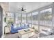 Bright sunroom with neutral colored furniture and lots of natural light at 3736 Brookhill Dr., Myrtle Beach, SC 29588