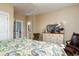 Bedroom featuring beautiful paintings, a tv, and comfortable seating at 405 Banyan Place, North Myrtle Beach, SC 29582