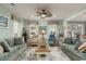 Inviting living room with comfortable seating, hardwood floors, and bright natural light at 405 Banyan Place, North Myrtle Beach, SC 29582