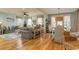 Open concept living space with wood floors and lots of natural light at 405 Banyan Place, North Myrtle Beach, SC 29582