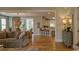 Open concept living space with wood floors and lots of natural light at 405 Banyan Place, North Myrtle Beach, SC 29582