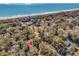 Stunning coastal lot with abundant trees and a short walk to the beach at 410 44Th Ave. N, Myrtle Beach, SC 29577