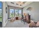 A bourbon bar area with three windows, decor, bar seating and overhead lighting provides ample light and comfort at 410 44Th Ave. N, Myrtle Beach, SC 29577