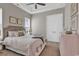Bedroom with a plush headboard, soft furnishings, and neutral color scheme, creating a cozy and inviting space at 410 44Th Ave. N, Myrtle Beach, SC 29577