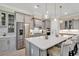 Kitchen with a large island, stainless steel appliances, and gray cabinets at 410 44Th Ave. N, Myrtle Beach, SC 29577