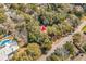 A treed lot features mature oak trees, partial lake views, and utilities for new construction and residential living at 410 44Th Ave. N, Myrtle Beach, SC 29577