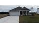 Charming single-Gathering home with a well-manicured lawn, a two-car garage, and inviting curb appeal at 433 Acosta Circle, Conway, SC 29527