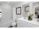 Clean and bright bathroom featuring double sinks, white cabinets, and a shower-tub combination at 434 Myrtle Meadows Dr, Conway, SC 29526
