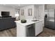 Well-equipped kitchen with island, stainless steel appliances, and modern finishes at 434 Myrtle Meadows Dr, Conway, SC 29526