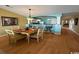 Inviting dining room with stylish table set next to the kitchen with breakfast bar at 4633 Lightkeepers Way # 5K, Little River, SC 29566