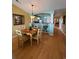 Open concept dining room with seating for four and adjacent view to the kitchen area at 4633 Lightkeepers Way # 5K, Little River, SC 29566