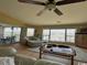 Inviting living room featuring a ceiling fan, comfortable seating, and a marina view at 4633 Lightkeepers Way # 5K, Little River, SC 29566