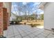 Tiled back patio overlooking the landscaped backyard at 4721 National Dr., Myrtle Beach, SC 29579