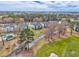 Aerial image showcasing condo buildings surrounding a golf course at 473 White River Dr. # C, Myrtle Beach, SC 29579