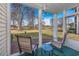 Comfortable screened porch perfect for enjoying the peaceful community views at 473 White River Dr. # C, Myrtle Beach, SC 29579