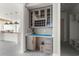 Built-in bar area with gray cabinets, wine rack, and elegant countertop at 481 Starlit Way, Myrtle Beach, SC 29579