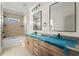 Bright bathroom with double vanity, modern fixtures, and tiled shower/tub combo at 481 Starlit Way, Myrtle Beach, SC 29579