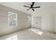 Cozy room with grey wall panelling, ceiling fan, and lots of natural light at 481 Starlit Way, Myrtle Beach, SC 29579