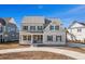 Charming two-story home with a covered front porch and well-manicured front yard at 481 Starlit Way, Myrtle Beach, SC 29579