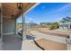 A welcoming front porch with exposed rafters and elegant brick pillars at 481 Starlit Way, Myrtle Beach, SC 29579