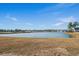 Scenic pond view in a residential community, showcasing waterfront living and peaceful surroundings at 481 Starlit Way, Myrtle Beach, SC 29579