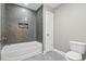 Bathroom featuring a bathtub and stylish tile surround at 5220 Mount Pleasant Dr., Myrtle Beach, SC 29579