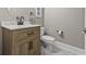 Charming powder room features a stylish vanity, modern fixtures, and a clean, minimalist design, perfect for guests at 5220 Mount Pleasant Dr., Myrtle Beach, SC 29579