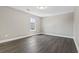 A bedroom with a window and stylish flooring at 5220 Mount Pleasant Dr., Myrtle Beach, SC 29579
