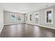 Bright bonus room with windows, stylish flooring, and ample natural light at 5220 Mount Pleasant Dr., Myrtle Beach, SC 29579