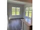 Bright dining area with wood floors and view to green scenery for relaxing meals at 5419 Shelly Lynn Dr., Myrtle Beach, SC 29579