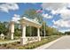 Welcoming community entrance with landscaping, signage, and American flag at 5419 Shelly Lynn Dr., Myrtle Beach, SC 29579