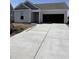 New construction home featuring a two-car garage and concrete driveway at 5419 Shelly Lynn Dr., Myrtle Beach, SC 29579