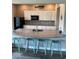 Stylish kitchen featuring a granite countertop, modern appliances, and comfortable seating for a welcoming atmosphere at 5419 Shelly Lynn Dr., Myrtle Beach, SC 29579