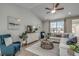 Spacious living room with vaulted ceilings, comfortable seating, and lots of natural light at 5419 Shelly Lynn Dr., Myrtle Beach, SC 29579