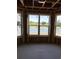 Framed pond view from a light-filled room, showcasing the peaceful outdoor scenery at 5419 Shelly Lynn Dr., Myrtle Beach, SC 29579