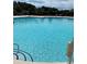 A pristine pool with crystal-clear water offers a refreshing escape under the open sky at 5419 Shelly Lynn Dr., Myrtle Beach, SC 29579