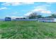 Expansive backyard featuring a large grassy area, storage shed, and above-ground pool for outdoor enjoyment at 544 Fox Chase Dr., Conway, SC 29527