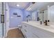 Bathroom vanity with double sinks, black hardware, and a custom tiled shower visible in the mirror at 544 Fox Chase Dr., Conway, SC 29527