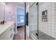 Well-appointed bathroom with a glass shower, a vanity, and access to the main bedroom at 544 Fox Chase Dr., Conway, SC 29527