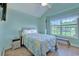 Comfortable bedroom with wood flooring, ample natural light, and vaulted ceilings at 544 Fox Chase Dr., Conway, SC 29527