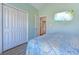Comfortable bedroom featuring a closet, wood-look flooring, and access to the en-suite bathroom at 544 Fox Chase Dr., Conway, SC 29527