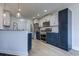 Kitchen with modern appliances, two-tone cabinetry, and sleek countertops offers style and functionality at 544 Fox Chase Dr., Conway, SC 29527