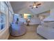 This spacious living room features a vaulted ceiling, a ceiling fan, and a wall-mounted television at 544 Fox Chase Dr., Conway, SC 29527