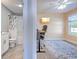 This office space features modern wood flooring, a ceiling fan, and an adjacent full bathroom at 544 Fox Chase Dr., Conway, SC 29527