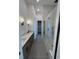 Bathroom boasts a glass shower, double sink vanity and modern finishes at 5515 Porcher Ave., Myrtle Beach, SC 29577