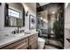 Elegant bathroom with marble countertops, glass shower, and modern fixtures at 5515 Porcher Ave., Myrtle Beach, SC 29577