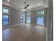 Bright bedroom features large windows, providing abundant natural light and backyard views at 5515 Porcher Ave., Myrtle Beach, SC 29577