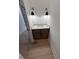 Hallway powder room featuring modern sconces and a marble countertop at 5515 Porcher Ave., Myrtle Beach, SC 29577